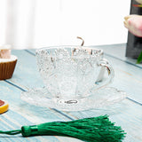 glass teacup with saucer